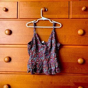 Cute formal shirt! Adjustable straps and adorable floral design.